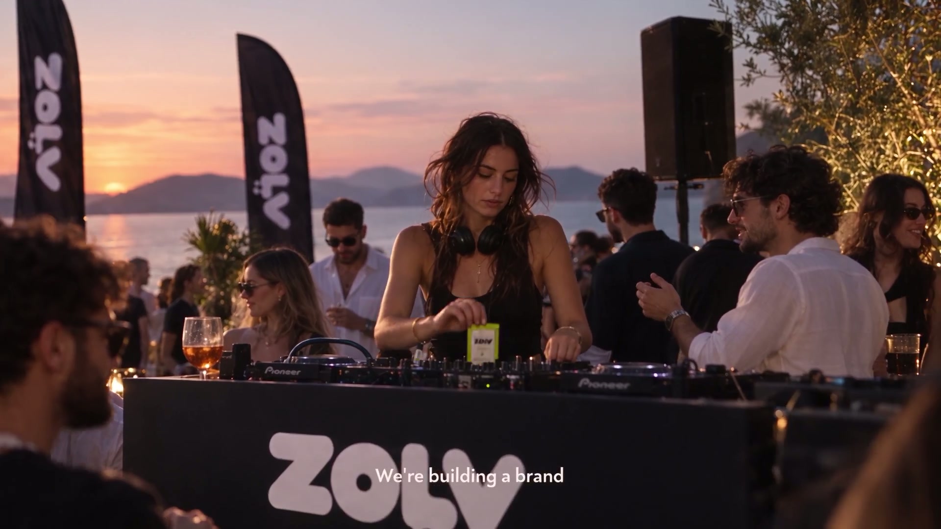 A ZOLV beach party at golden hour